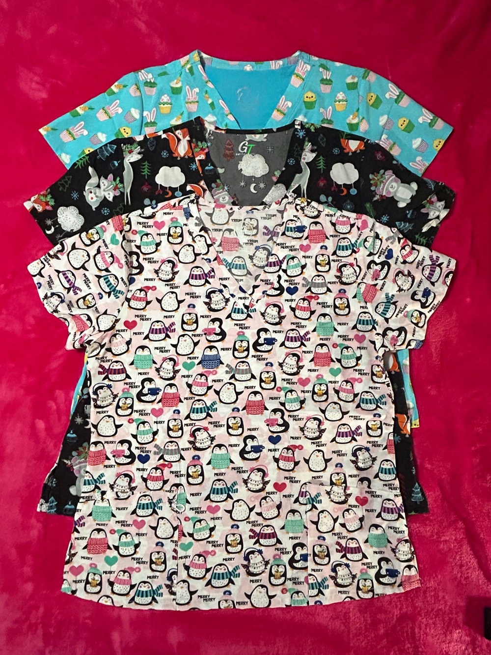 Women’s Holiday Scrub Tops - size Large. NWOT. PRICE IS FOR THE ENTIRE BUNDLE!